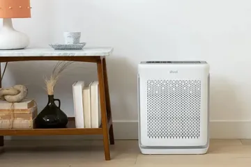 Levoit Vital 200S-P air purifier styled in a home living room setting