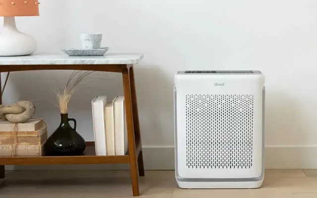 Levoit Vital 200S-P air purifier styled in a home living room setting