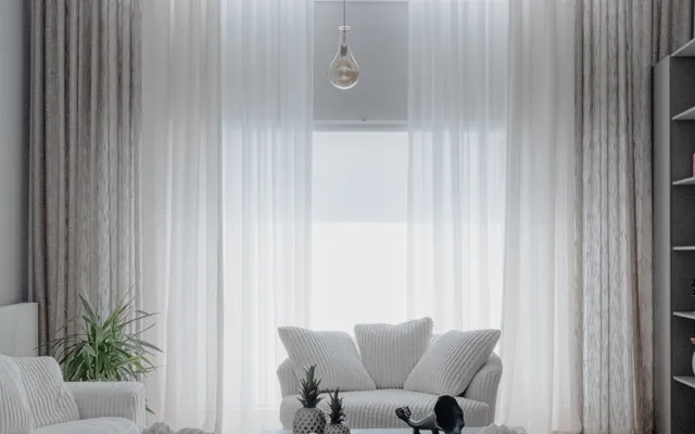 Bright, clean modern living room with soft white interiors